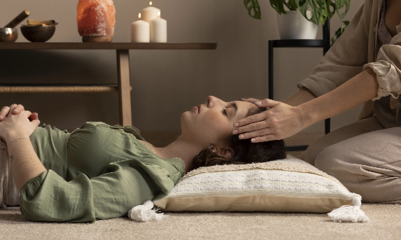 person-conducting-reiki-therapy
